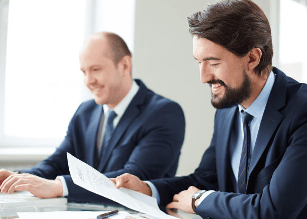 Experts checking documents, symbolizing specialized document translation services in Milwaukee for various industries.