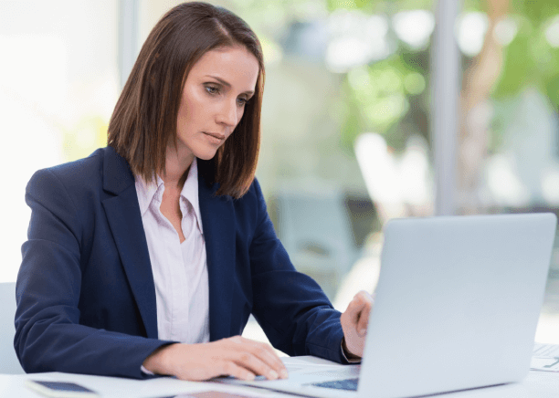 Professional uses a laptop, representing San Francisco's diverse and multicultural translation for global communication. Professional uses a laptop, representing San Francisco's diverse and multicultural translation for global communication.