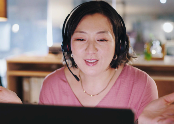 A laptop shows folder exports and file types as Calgary Translation Services completes multi-format digital file translation.