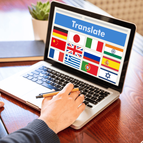 A laptop displaying translation, emphasizing multilingual contract translation services for seamless global communication.