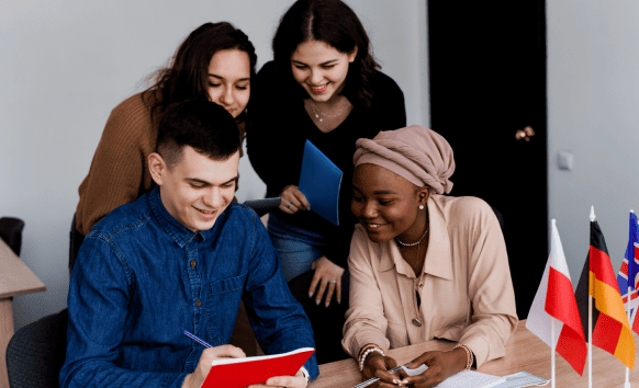 Diverse group of translator collaborating with a laptop, showcasing multilingual engineering translation services. Diverse group of translator collaborating with a laptop, showcasing multilingual engineering translation services.