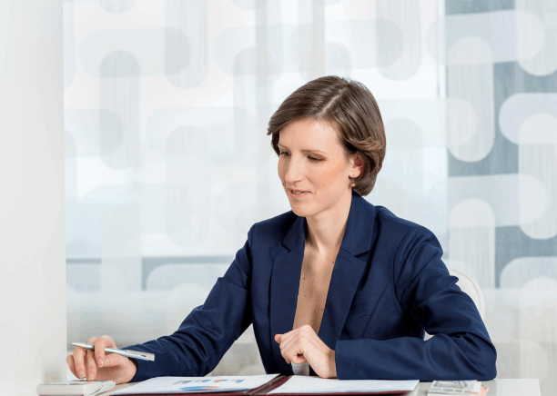 A marketer reviews multilingual website pages side by side using Oklahoma City Translation Services before publishing.