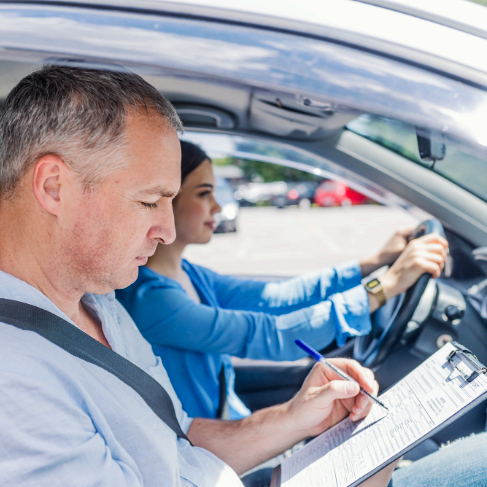 A notary stamps Driver's License Translation Services documents requested by a DMV or other government agency.
