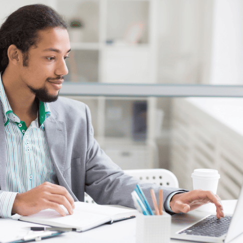 Professional translator working on business documents, ensuring accuracy and confidentiality with Oklahoma City Translation.