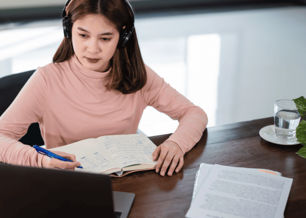 Translator working on accurate personal document translation, ensuring customer satisfaction with Oklahoma City Translation.
