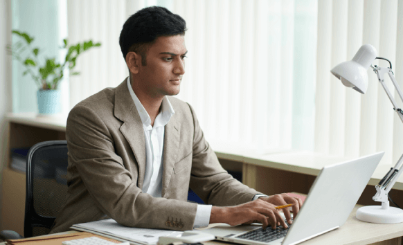 Translator working on Omaha translation, showcasing benefits like accuracy, rush delivery, and customer satisfaction.