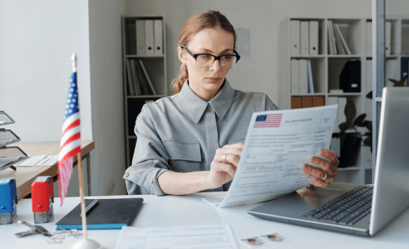 A translator counts source words in a document to estimate per-word unit pricing at Battle Ground Translation Services.