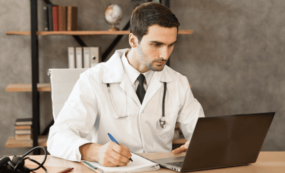 A professional medical translator accurately translating healthcare documents using certified medical translation services.