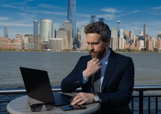 A finance analyst reviews a translated annual report, using New York Translation Services for financial market filings.