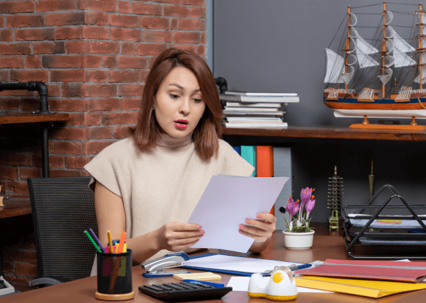 Proofreader reviewing documents meticulously at philadelphia-translation-services.