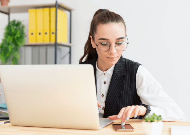 A professional working on a laptop, showcasing business translation services that ensure confidentiality in contracts. A professional working on a laptop, showcasing business translation services that ensure confidentiality in contracts.