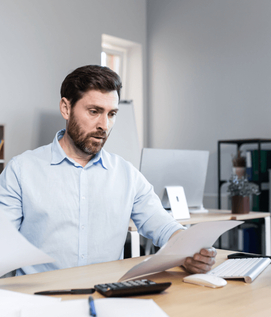 A QA lead runs final checks on a safety manual, documenting quality Appliance translation services for compliance.