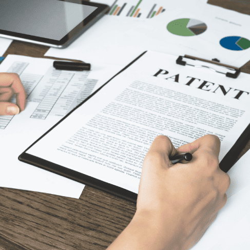 Translator carefully handling patent documents to protect innovations, ensuring compliance and clarity in technical terms Translator carefully handling patent documents to protect innovations, ensuring compliance and clarity in technical terms