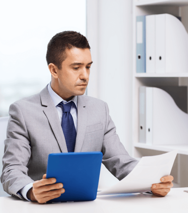 A happy client holding the translated retails docment.