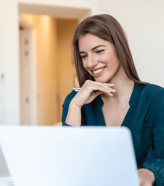 A woman works on her laptop, showcasing urgent translation services and delivering fast and accurate results. A woman works on her laptop, showcasing urgent translation services and delivering fast and accurate results.