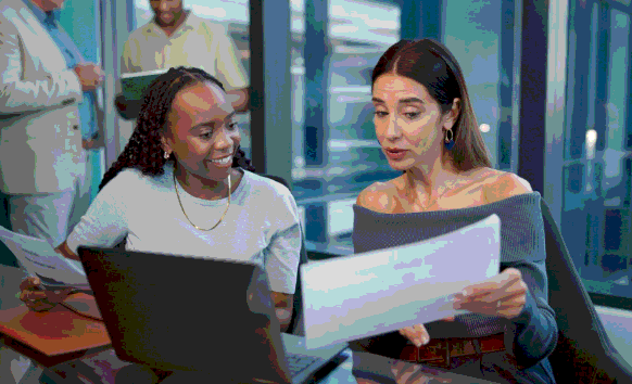 A team uses a secure client portal as Enterprise Translation Services routes business documents to linguists for delivery.