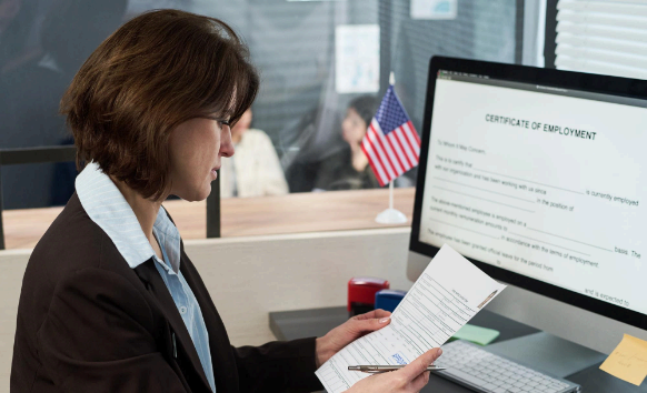 A QA lead checks a translated contract at Minneapolis Translation Services, ensuring fast delivery and secure handling.