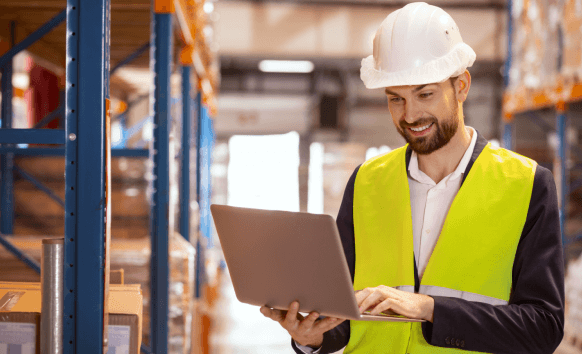An engineer uploads CAD files via a secure transfer portal while Heavy Equipment Translation Services process the job safely.