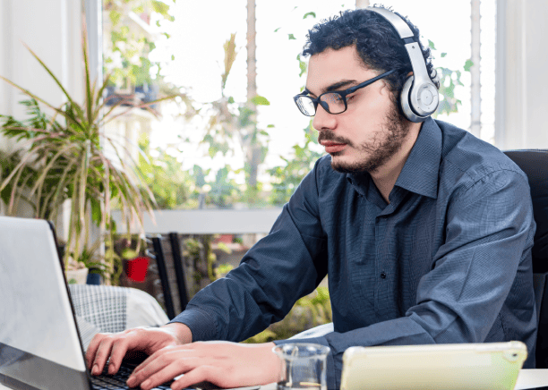 The expert crafts multilingual video descriptions using SEO media translation services to improve discoverability.