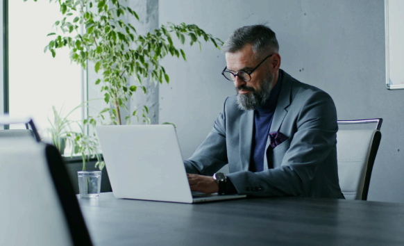 A project manager speeds Social Media Translation Services, reviewing urgent influencer copy so a launch stays on schedule.