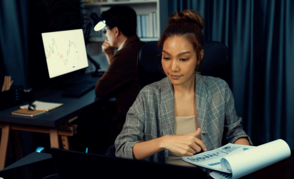 A producer reviews subtitles for a training video as Tagalog Translation Services adapt dialect phrasing for regional.