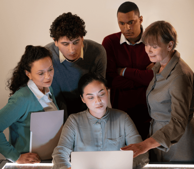 Team of linguists accurately translating a complex technical document together in San Francisco. Team of linguists accurately translating a complex technical document together in San Francisco.