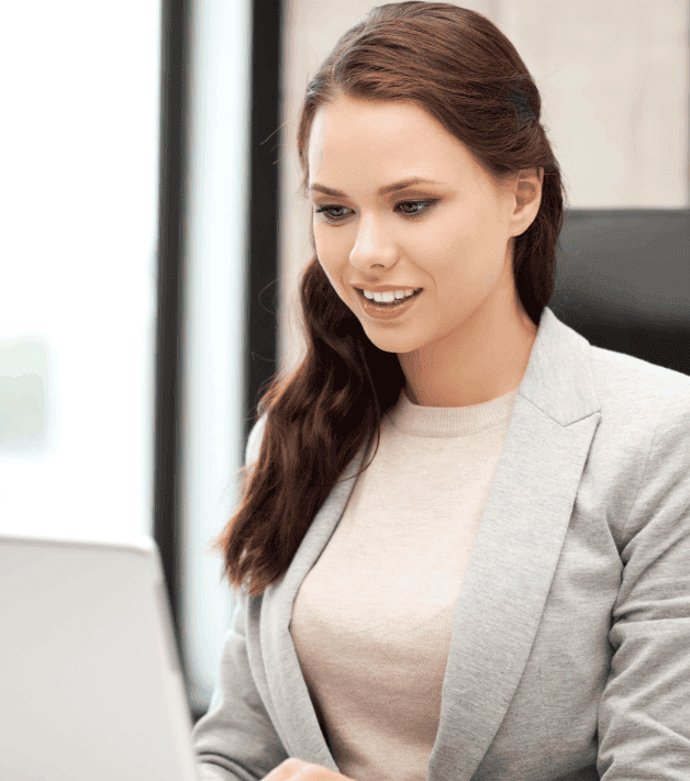 A expert working on a laptop, emphasizing technical translation services in Calgary with expertise in complex terminology.