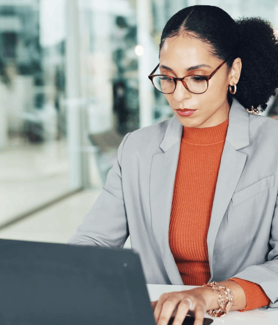 A linguist updates a terminology sheet for a complex survey platform, using Survey Translation Services for consistency.