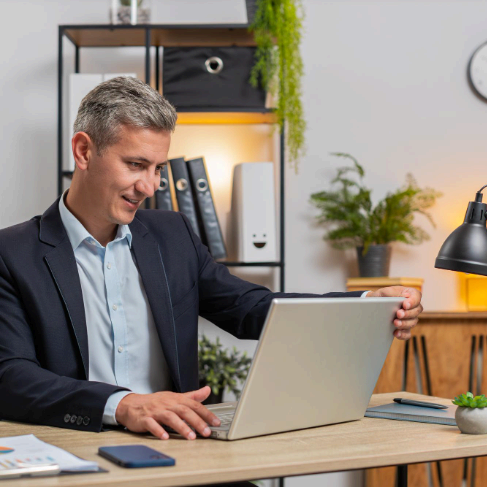 A property manager compares bilingual lease clauses and dates on screen, using Agreement Translation Services for accuracy.