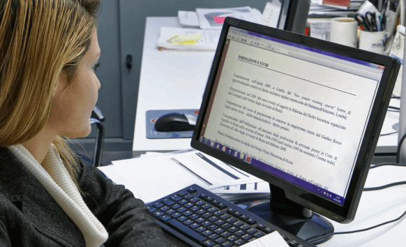 An HR lead reviews a bilingual internal update, using Newsletter Translation Services to keep the business tone familiar.