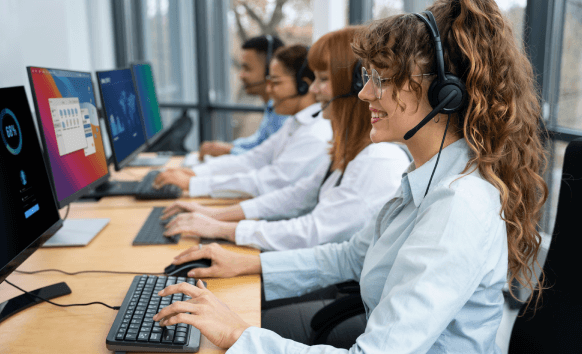 Multi-lingual team works on transcript translation services, ensuring accurate translations for global communication.