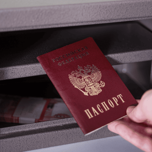 A locked Russian passport with currency notes, ensuring secure and confidential passport translation services.
