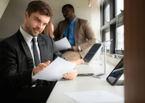 A procurement manager compares a vendor agreement as Contract Translation Services handle industry-specific clauses.