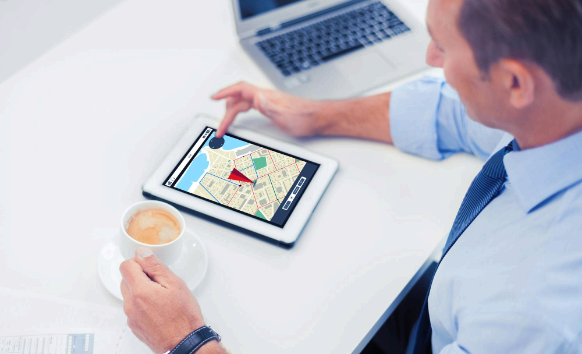 A content editor tests a localized homepage and form as Minneapolis Translation Services aligns tone for website.
