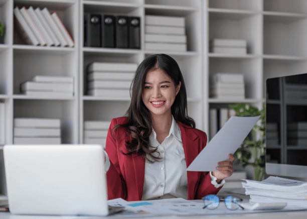 A translator formats a certified translation with stamps and tables while Yuma Translation Services lists formatting costs.