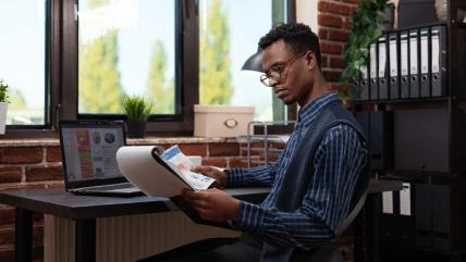 Professional translator working on brochure translation services that seamlessly adapt to brochure design types. Professional translator working on brochure translation services that seamlessly adapt to brochure design types.
