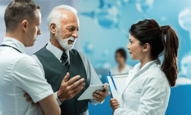 Translator and a clinical doctor discussing the precision required in clinical trials translation for research documentation. Translator and a clinical doctor discussing the precision required in clinical trials translation for research documentation.