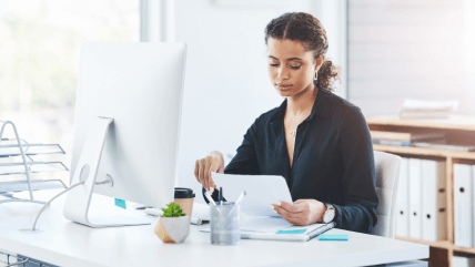 Professional translator reviews business documents for document translation services to meet various business needs. Professional translator reviews business documents for document translation services to meet various business needs.