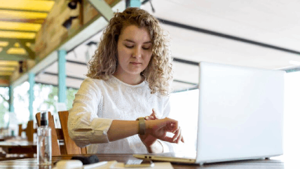 Woman working on a laptop, signifying how museum translation accessibility services can enhance visitor engagement. Woman working on a laptop, signifying how museum translation accessibility services can enhance visitor engagement.