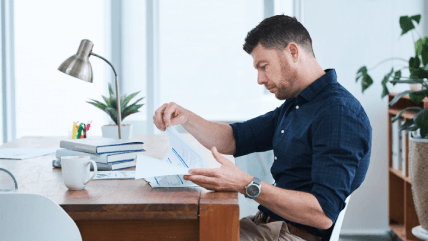 A translator reviews documents to ensure fast turnaround for brochure translations without compromising the quality. A translator reviews documents to ensure fast turnaround for brochure translations without compromising the quality.