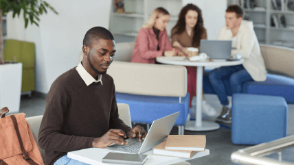 Professional using a laptop, representing Hebrew corporate translation services for seamless business communication. Professional using a laptop, representing Hebrew corporate translation services for seamless business communication.