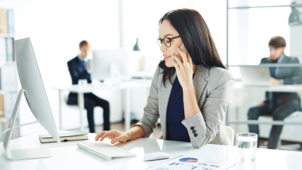 A professional working at a desk, symbolizing Hebrew government document translation services for official purposes. A professional working at a desk, symbolizing Hebrew government document translation services for official purposes.