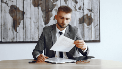 A translator reviews document to focusing on international document translations to seamless global communication. A translator reviews document to focusing on international document translations to seamless global communication.