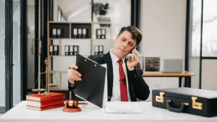 Expert working with gavel with a legal document, illustrating custom legal document translation services to business needs. Expert working with gavel with a legal document, illustrating custom legal document translation services to business needs.