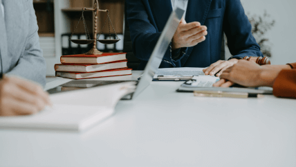A lawyer discussing with translator for accurate & reliable legal document translations for international and court-related. A lawyer discussing with translator for accurate & reliable legal document translations for international and court-related.