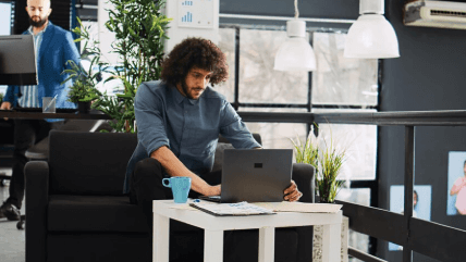 Expert reviewing documents on a laptop, representing science museum translation that communicate complex scientific concepts. Expert reviewing documents on a laptop, representing science museum translation that communicate complex scientific concepts.