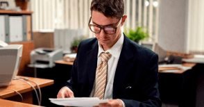 A translator working on legal documents, providing Oklahoma City Translation Services for clear and accurate contracts.