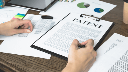 Translator carefully handling patent documents to protect innovations, ensuring compliance and clarity in technical terms Translator carefully handling patent documents to protect innovations, ensuring compliance and clarity in technical terms