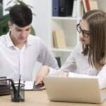 A professional translator working on a document, representing the best Spanish document translation service for your business needs.