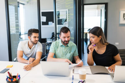 A group of person translate the spanish document without any mistake
